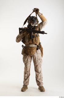 Casey SchneiderParatrooper in Desert Marpat Pose 6 holding gun standing…
